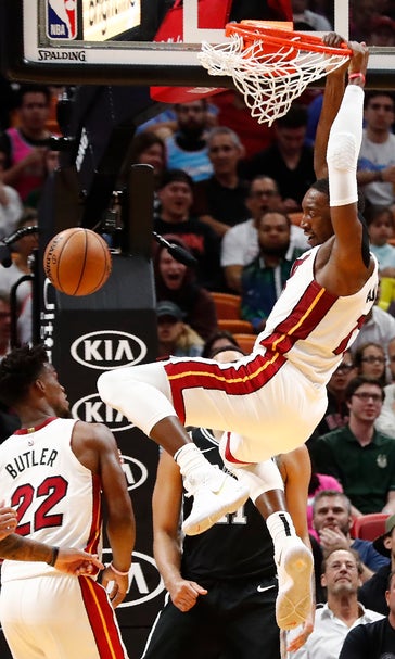 Nunn scores 33, Heat 18-1 at home after edging Spurs 106-100